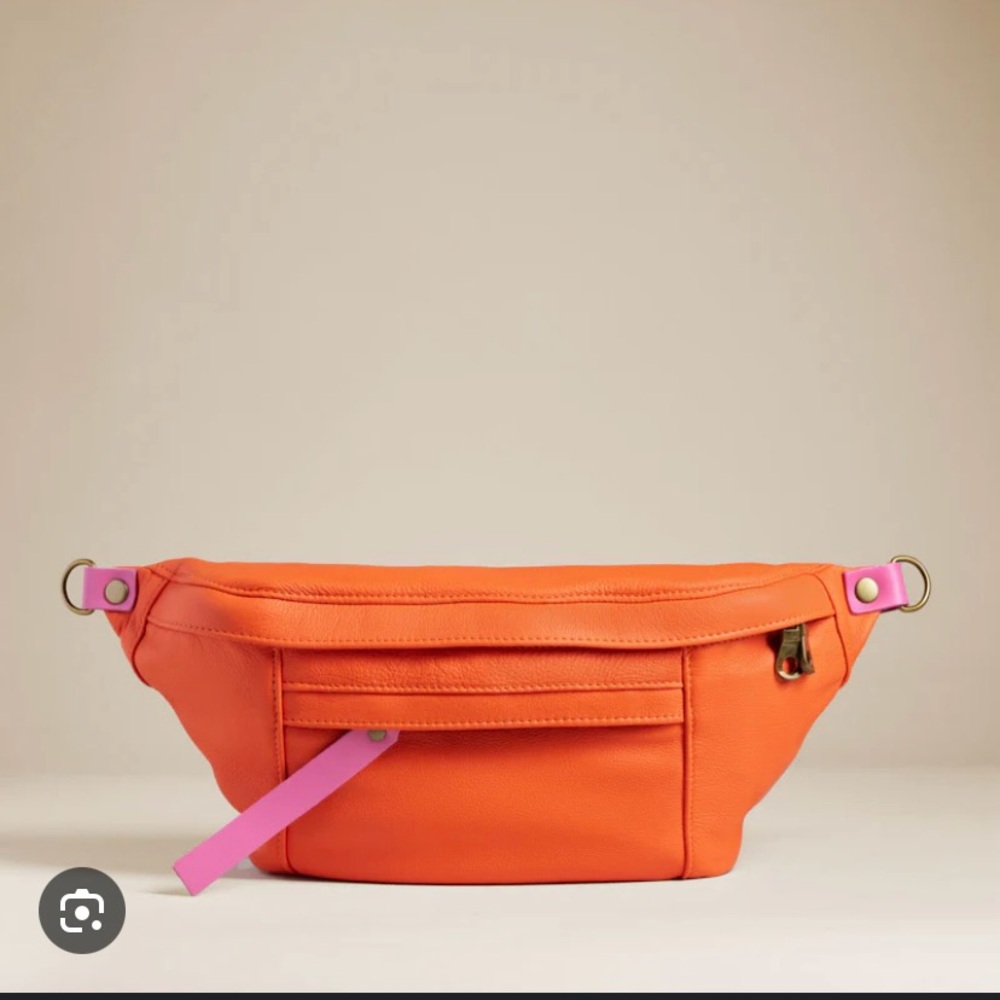 ISO*** Orange leather sling. Parker Thatch